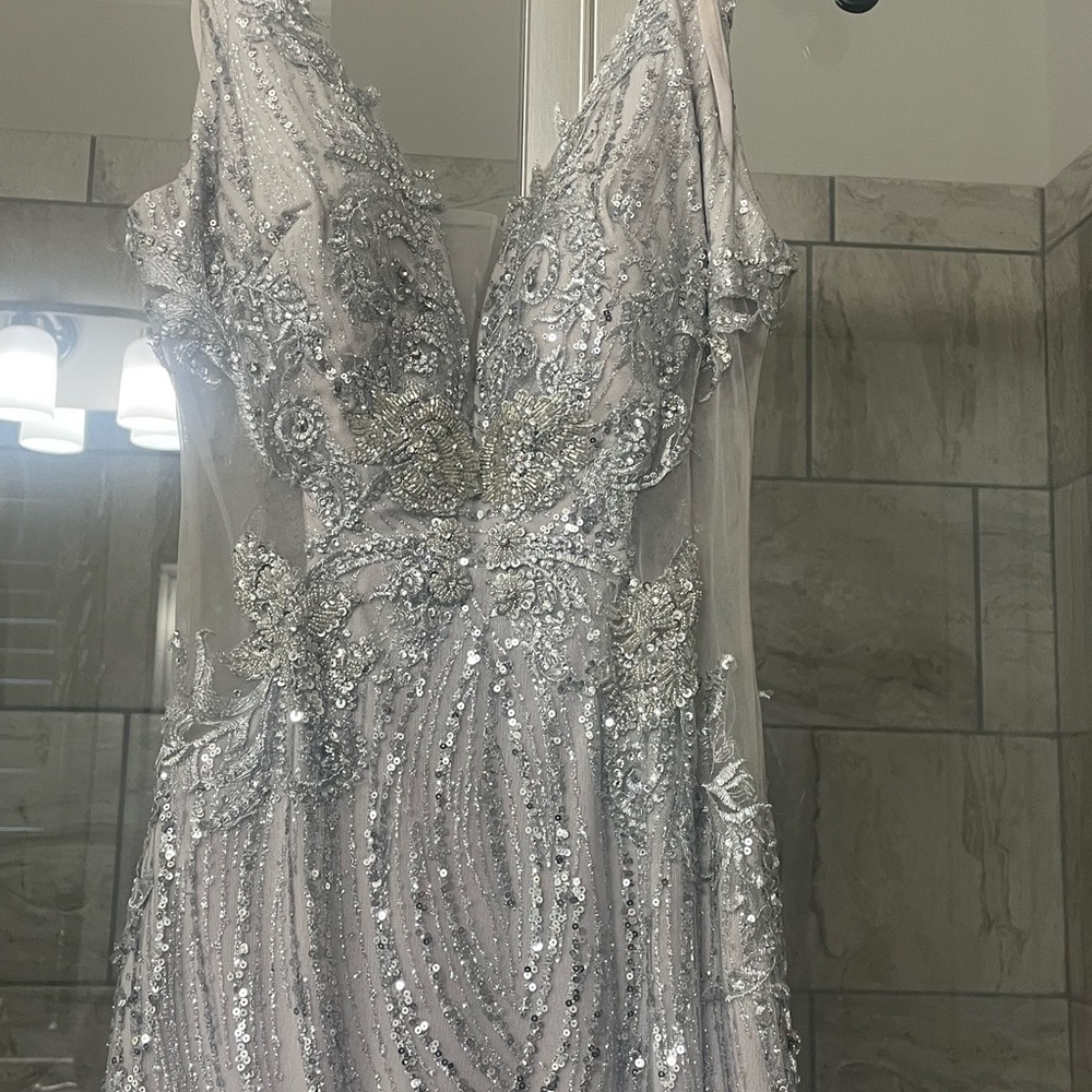 Dramatic, sparkling Portia and Scarlet gown with high slit
